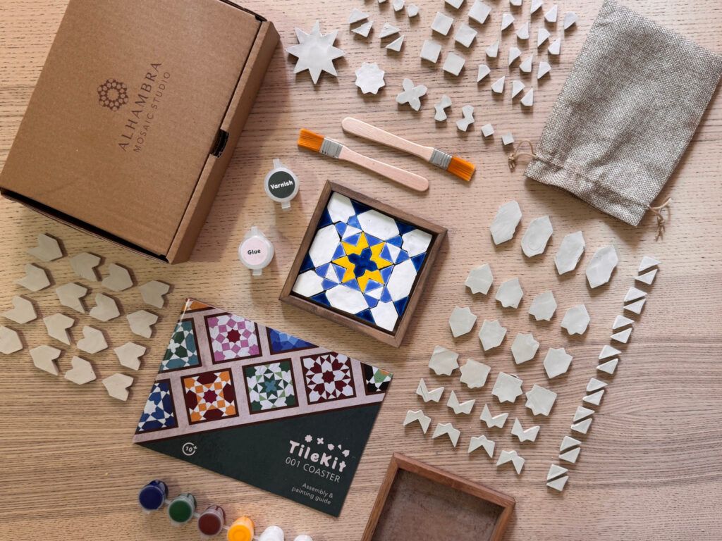 Kit contents with a blue and yellow coaster in the Fez / Marrakesh palette